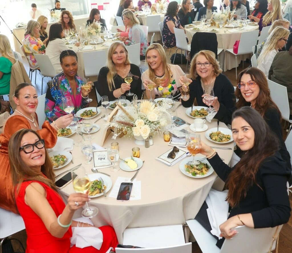 BRA Members making a toast at Women on the Rise 2024